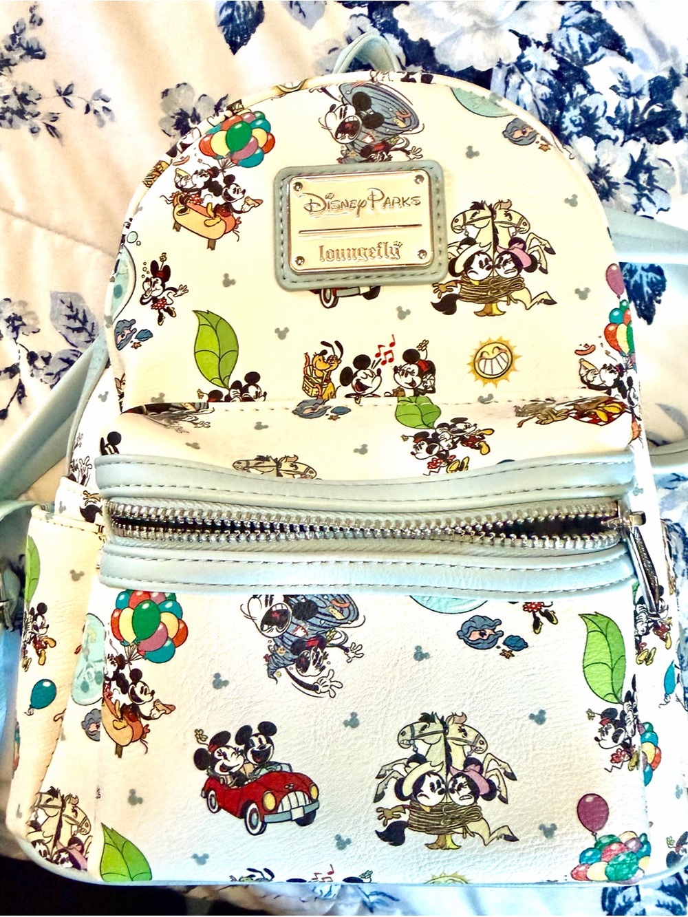 Loungefly Light Blue Mini Backpack with Park Icon Lining
